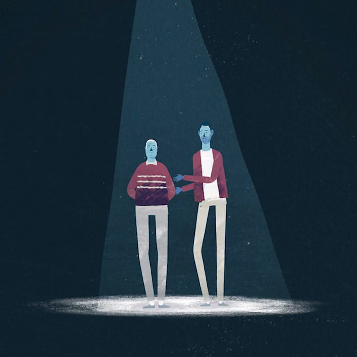 Still from an animation of a father standing with his son in a spotlight